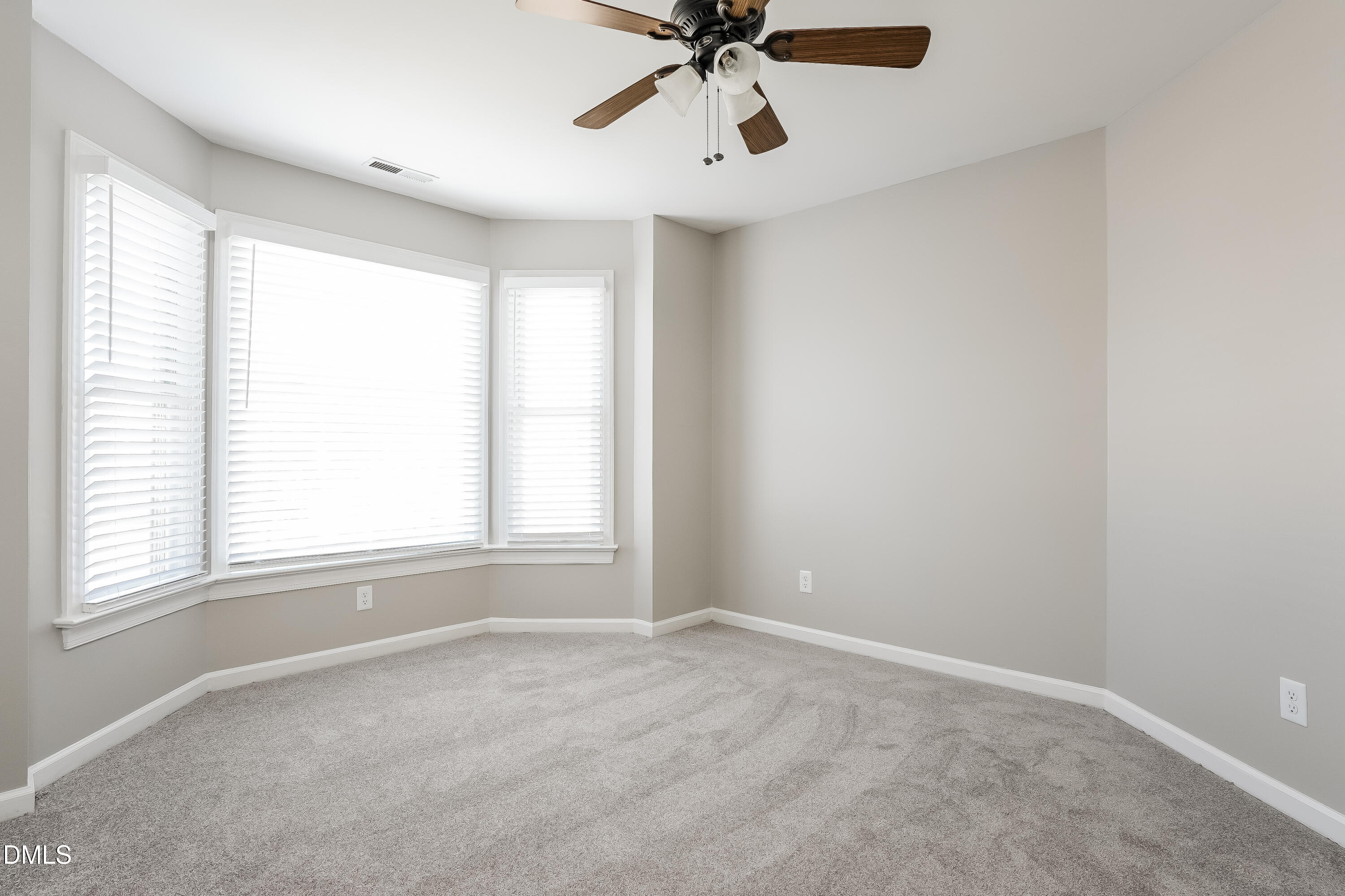 17 Edinburgh Place Clayton, NC 27527 - Photo 8 of 17 a view of an empty room with a window