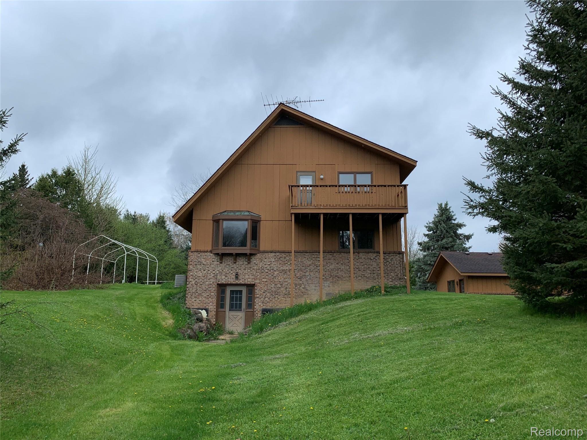 812 North Hacker Road Howell, MI 48843 - Photo 27 of 27 back