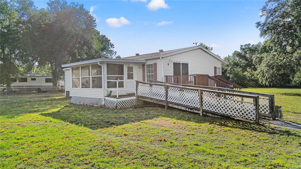 10810 Trails End Lakeland, FL 33809 - Photo 1 of 1 a view of a house with a wooden fence