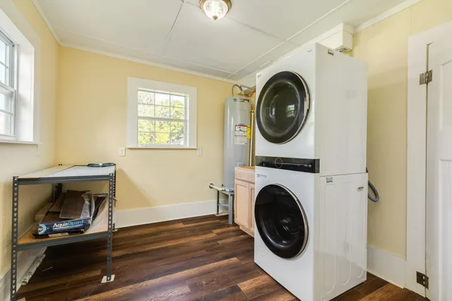 a view of a hallway with washer and dryer