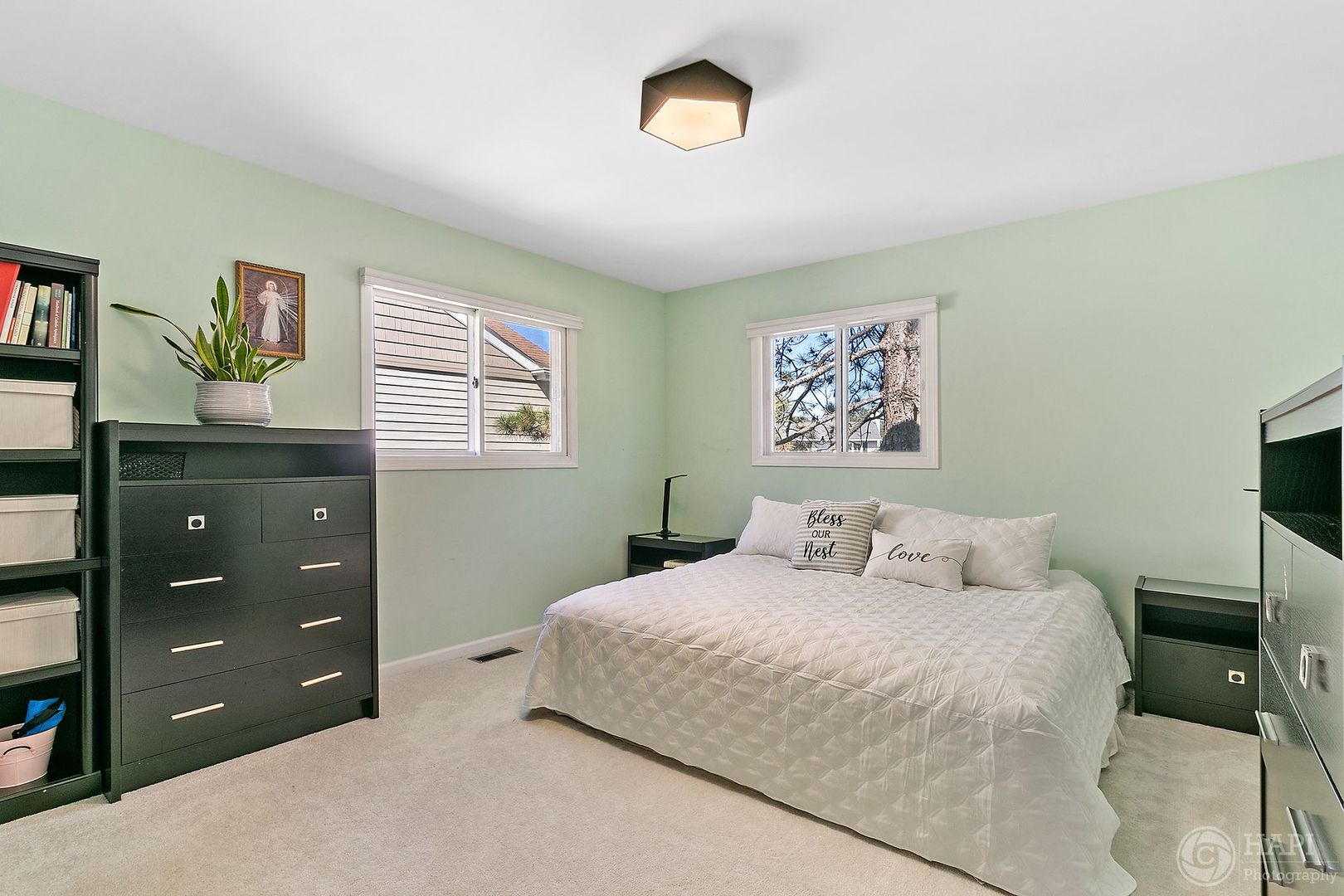10 Butterfield Road Lake Zurich, IL 60047 - Photo 2 of 2 a bedroom with a bed and a dresser