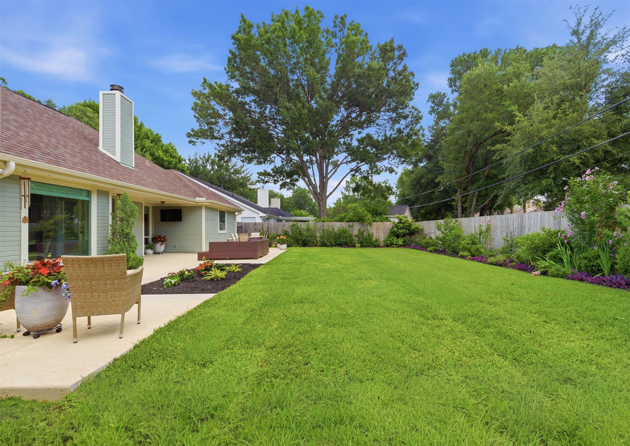2810 Brandy Lane Georgetown, TX 78628 - Photo 32 of 38 a view of a house with backyard sitting area and garden