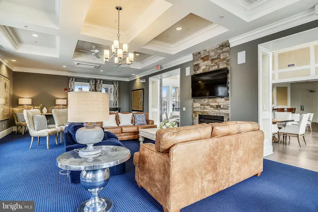 a dining room with furniture window and wooden floor