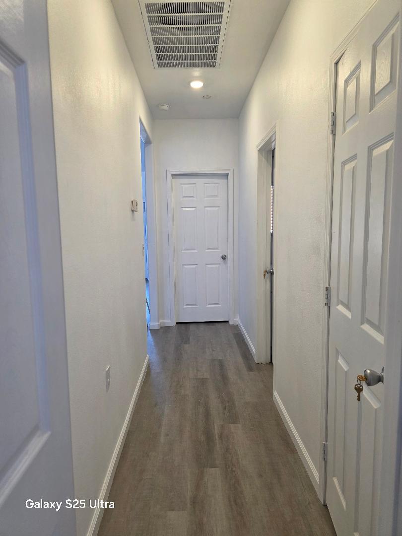 36768 Verde Avenue Madera, CA 93636 - Photo 10 of 17 a view of a hallway