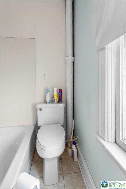 170 South Whitfield Street Nazareth, PA 18064 - Photo 9 of 29 a white toilet sitting next to a bathroom sink and a window