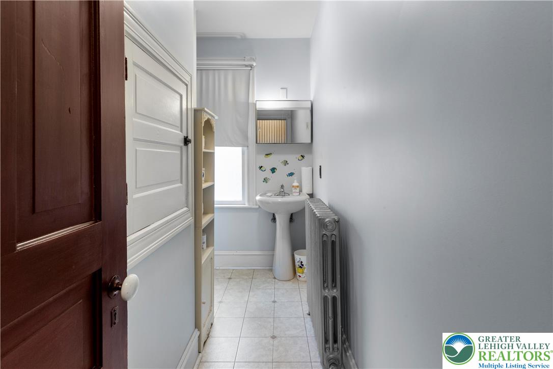 170 South Whitfield Street Nazareth, PA 18064 - Photo 10 of 29 a bathroom with a sink and mirror