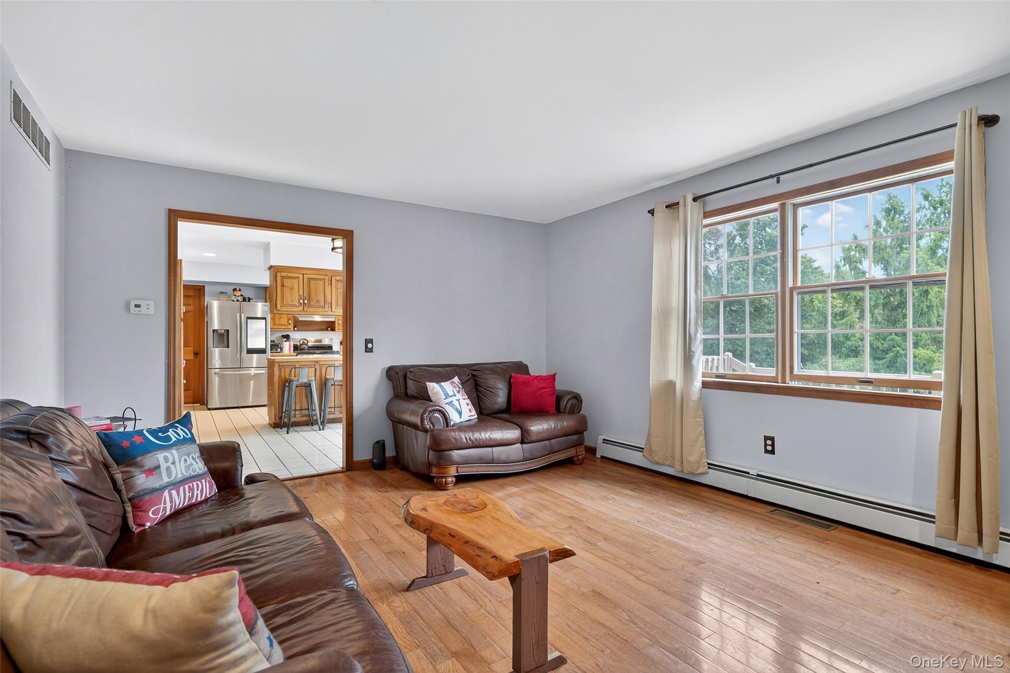 214 Dubois Road Gardiner, NY 12561 - Photo 13 of 38 a living room with furniture and a large window
