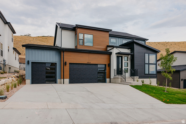 5910 Canyon Rim Road, Unit 619 Lehi, UT 84048 - Photo 1 of 52 Contemporary exterior with contrasting siding materials, multiple large windows, and a prominent entry