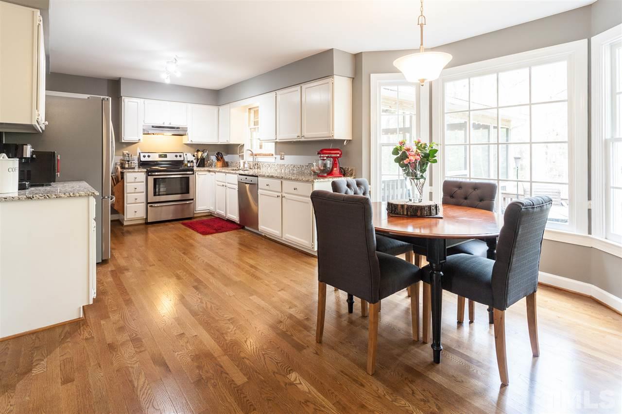 5321 Fairmead Circle Raleigh, NC 27613 - Photo 3 of 23 Open kitchen with granite counter tops.