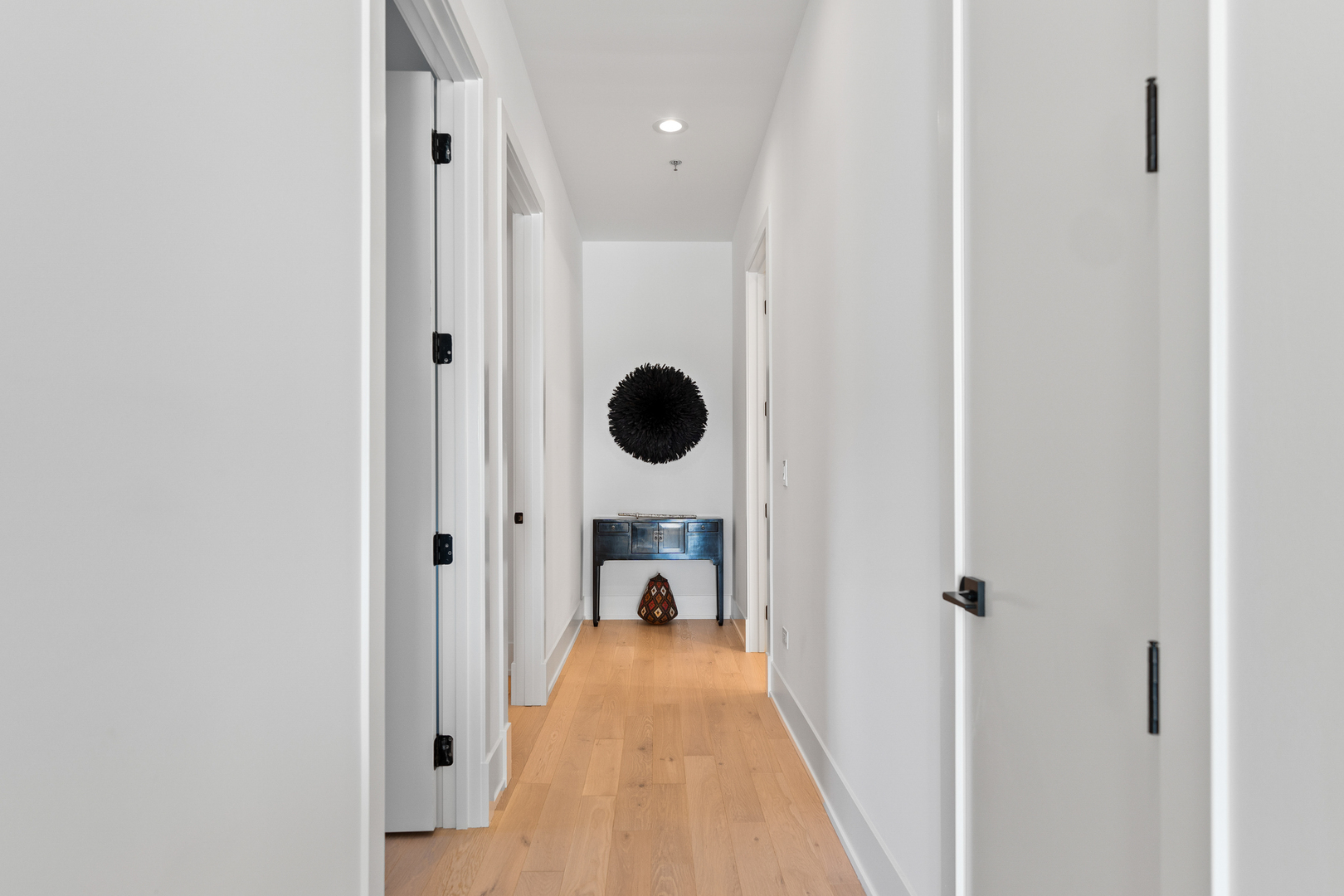 1767 West Rosehill Drive, Unit 304 Chicago, IL 60660 - Photo 19 of 36 a view of a hallway with wooden floor windows and closet