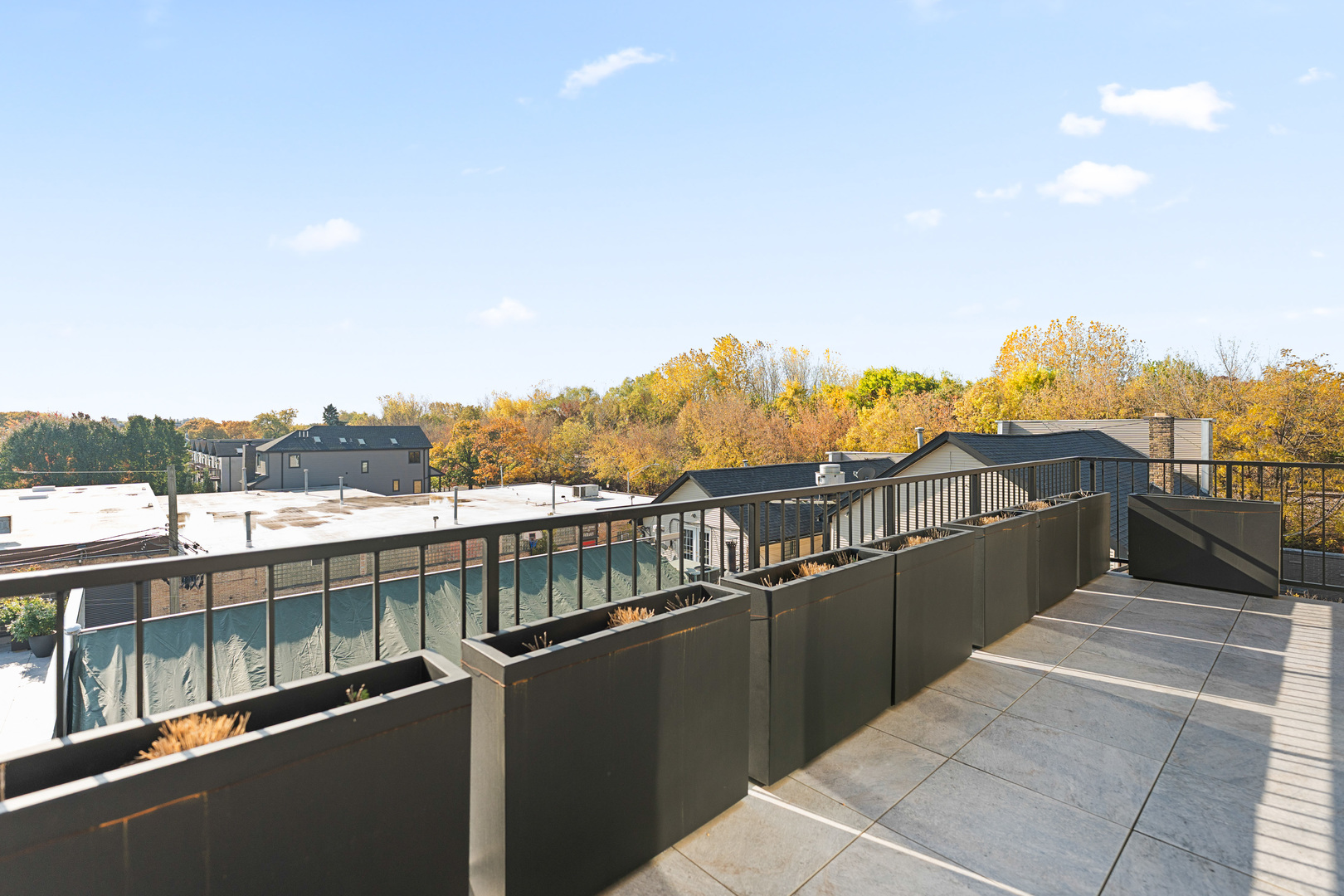 1767 West Rosehill Drive, Unit 304 Chicago, IL 60660 - Photo 26 of 36 a view of a balcony with city view