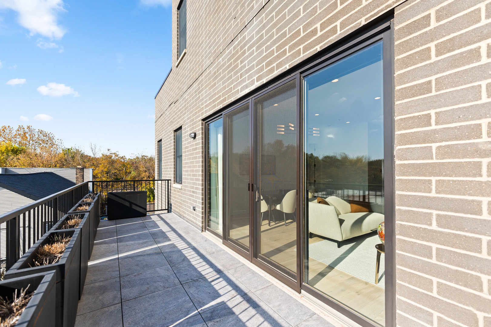 1767 West Rosehill Drive, Unit 304 Chicago, IL 60660 - Photo 27 of 36 a view of balcony with a potted plant