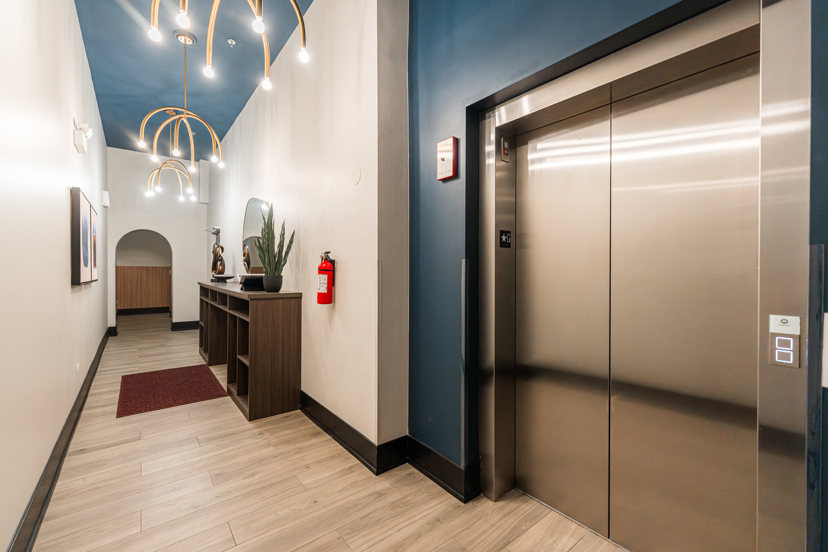 1767 West Rosehill Drive, Unit 304 Chicago, IL 60660 - Photo 33 of 36 a kitchen with stainless steel appliances kitchen island granite countertop dining table and chairs
