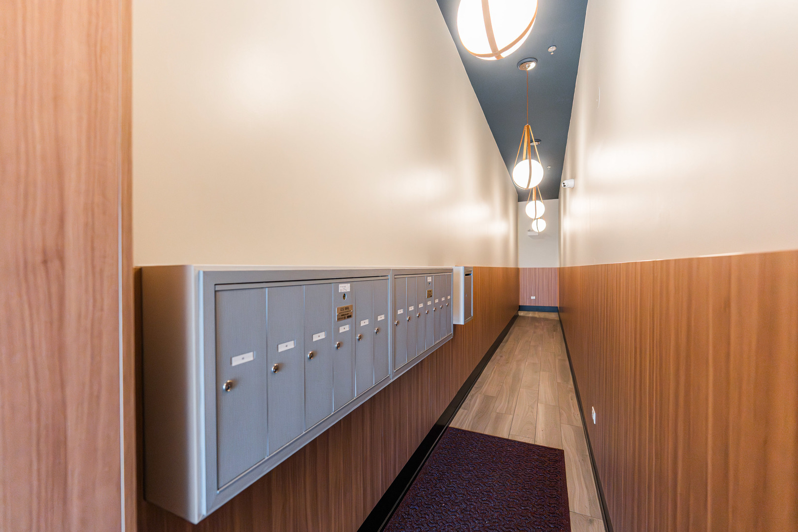 1767 West Rosehill Drive, Unit 304 Chicago, IL 60660 - Photo 34 of 36 a view of a hallway with wooden floor