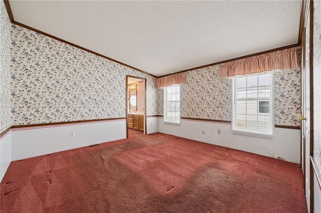 236 Ridge Lane Murrysville, PA 15668 - Photo 8 of 12 a view of an empty room with a window