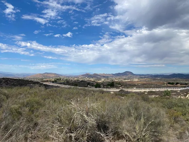 a view of a lake in middle of the house