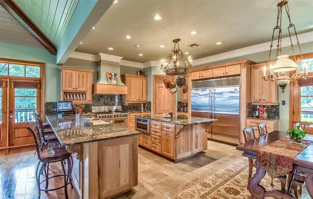 a kitchen with a stove and a sink