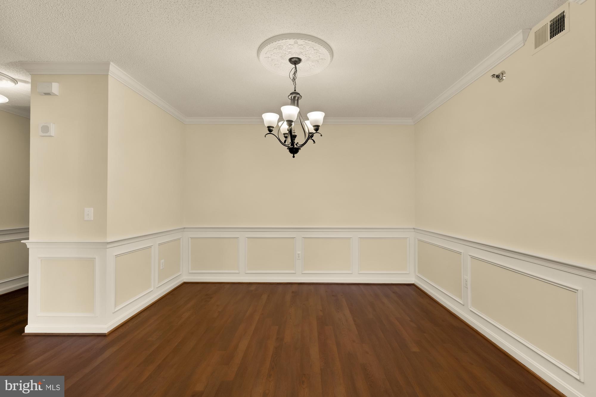 3005 South Leisure World Boulevard, Unit 201 Silver Spring, MD 20906 - Photo 12 of 38 a view of a room with wooden floors and led lights