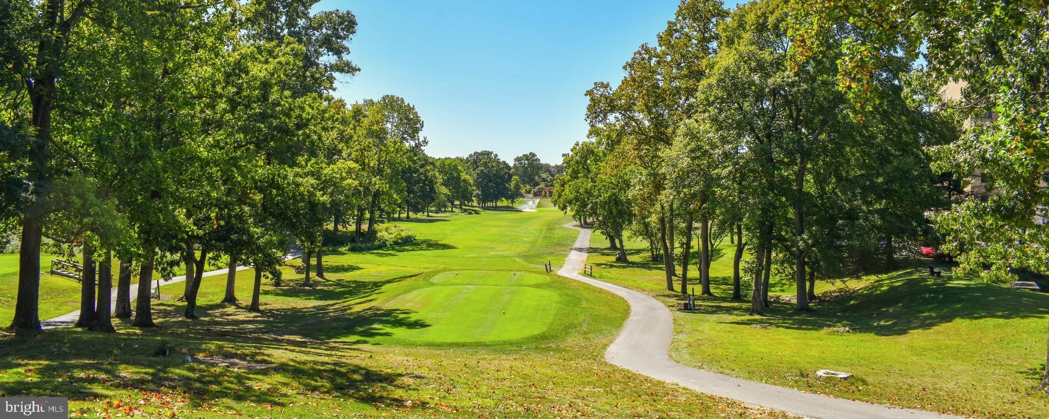 3005 South Leisure World Boulevard, Unit 201 Silver Spring, MD 20906 - Photo 34 of 38 a view of a swimming pool with a patio