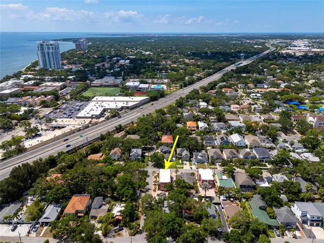 an aerial view of a house with a garden