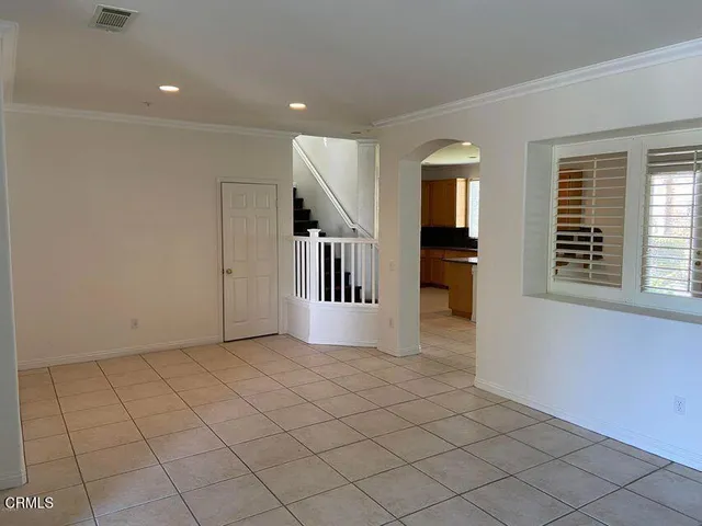 a view of a livingroom with a staircase