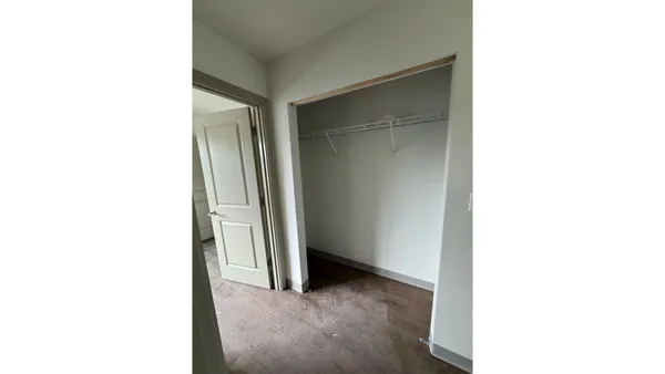 a view of a room that has a window in it