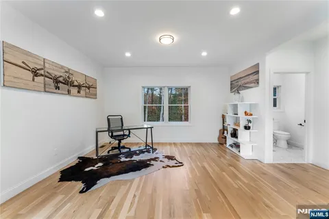 a living room with furniture and a gate