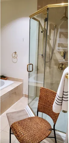 a bathroom with a sink and a shower