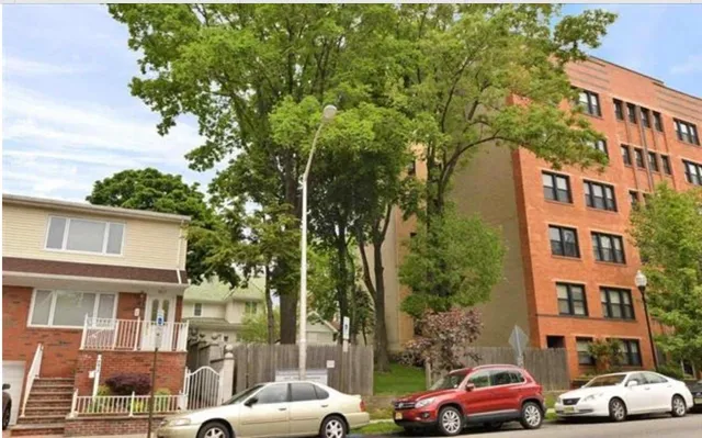 a cars parked in front of a building