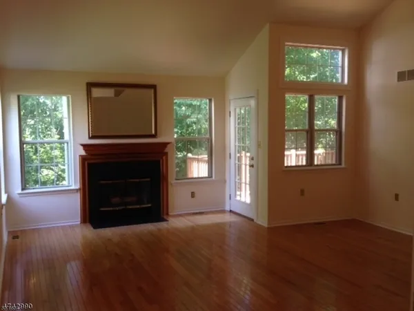 a view of a livingroom with a fireplace