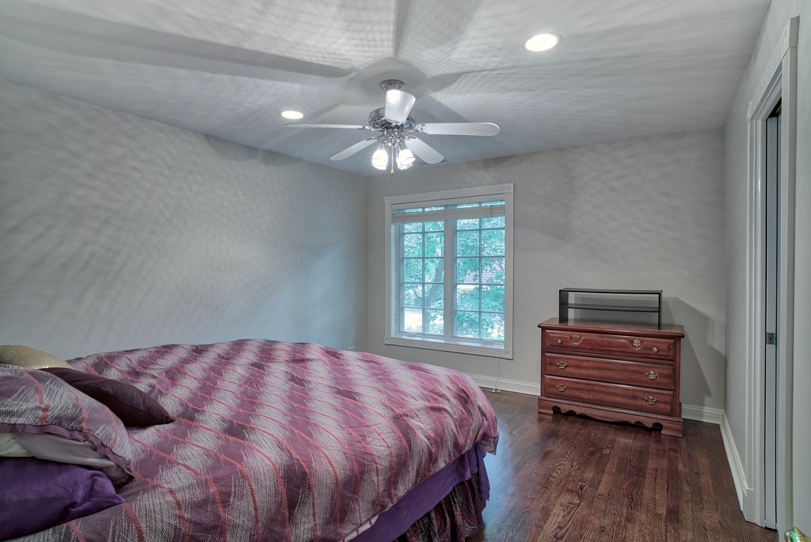 1830 Telegraph Road Lake Forest, IL 60045 - Photo 20 of 33 a bedroom with a bed and a chandelier