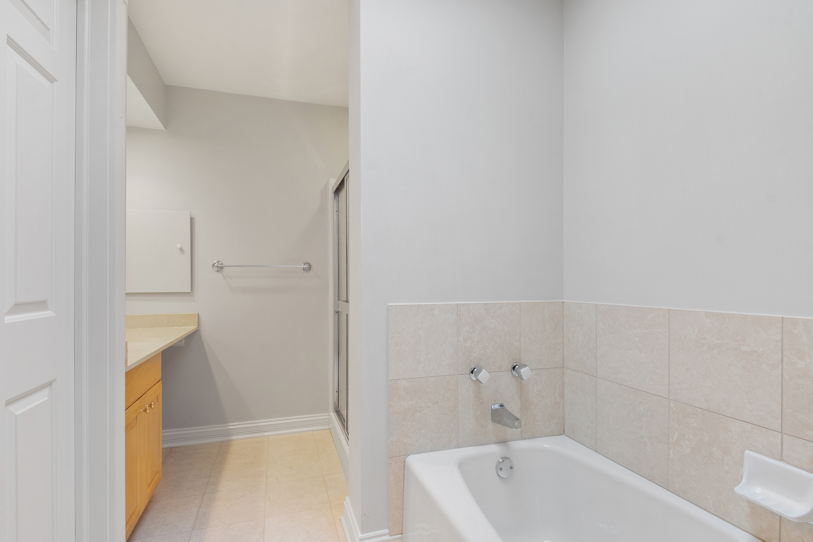 1830 Telegraph Road Lake Forest, IL 60045 - Photo 24 of 33 a bathroom with a bathtub and shower