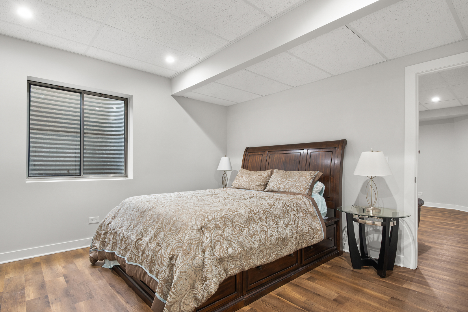 1830 Telegraph Road Lake Forest, IL 60045 - Photo 30 of 33 a bedroom with a bed and a night stand