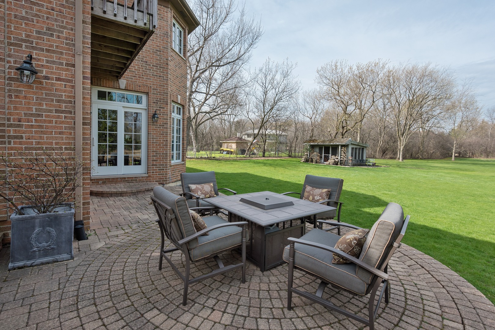 1830 Telegraph Road Lake Forest, IL 60045 - Photo 31 of 33 a view of a table and chairs in backyard of the house