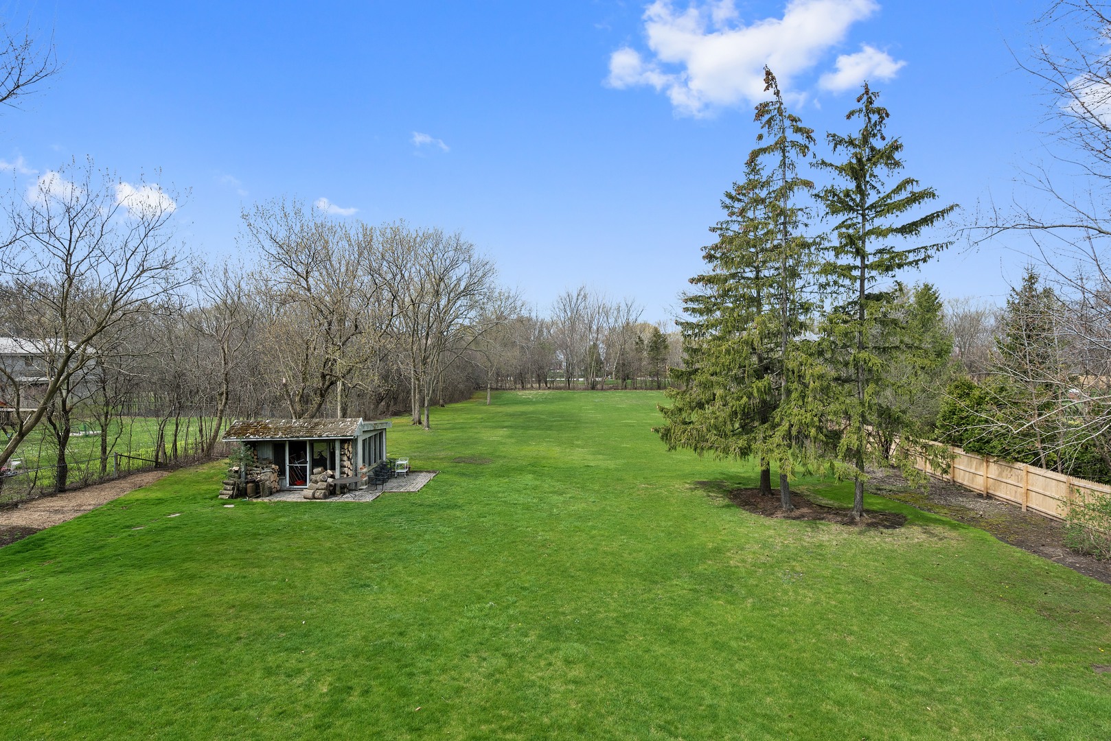 1830 Telegraph Road Lake Forest, IL 60045 - Photo 33 of 33 a view of a garden with a bench