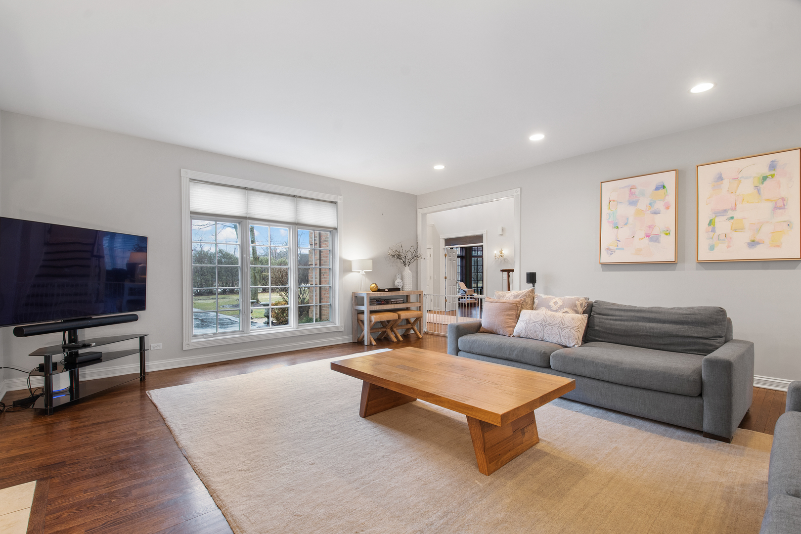 1830 Telegraph Road Lake Forest, IL 60045 - Photo 7 of 33 a living room with furniture flat screen tv and a large window