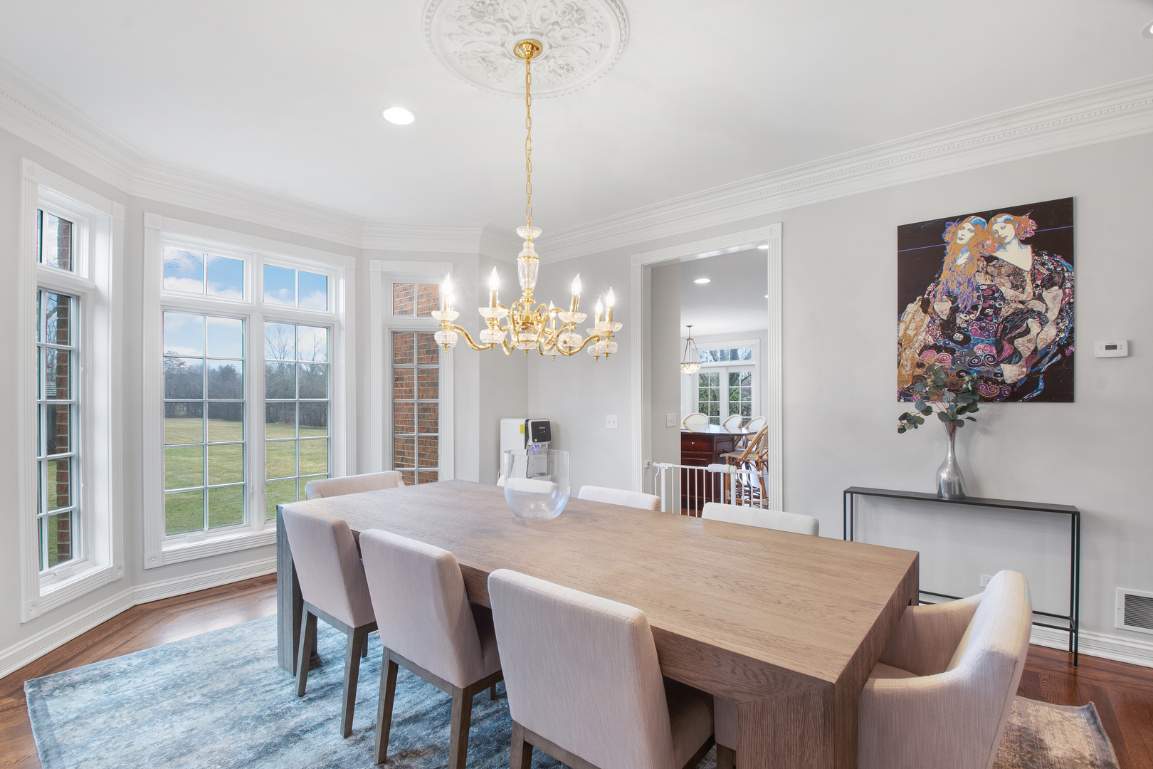 1830 Telegraph Road Lake Forest, IL 60045 - Photo 8 of 33 a view of a dining room with furniture a chandelier and wooden floor