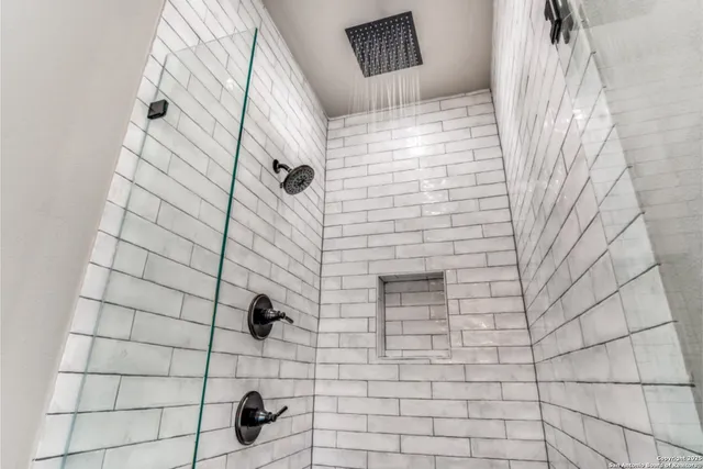 a view of a livingroom with furniture and windows