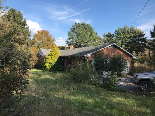 6105 North Fork Road Elliston, VA 24087 - Photo 1 of 12 a backyard of a house with lots of green space
