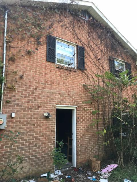 6105 North Fork Road Elliston, VA 24087 - Photo 11 of 12 a brick building with a door