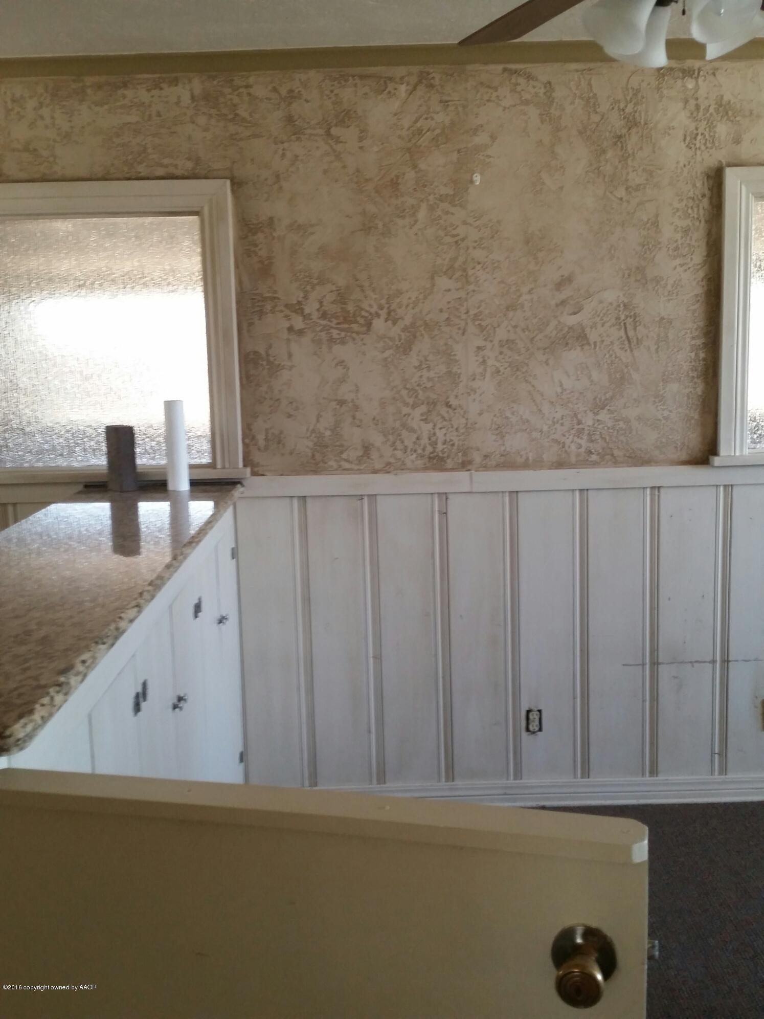 301 South Tyler Street Amarillo, TX 79101 - Photo 18 of 22 a view of kitchen with wooden floor