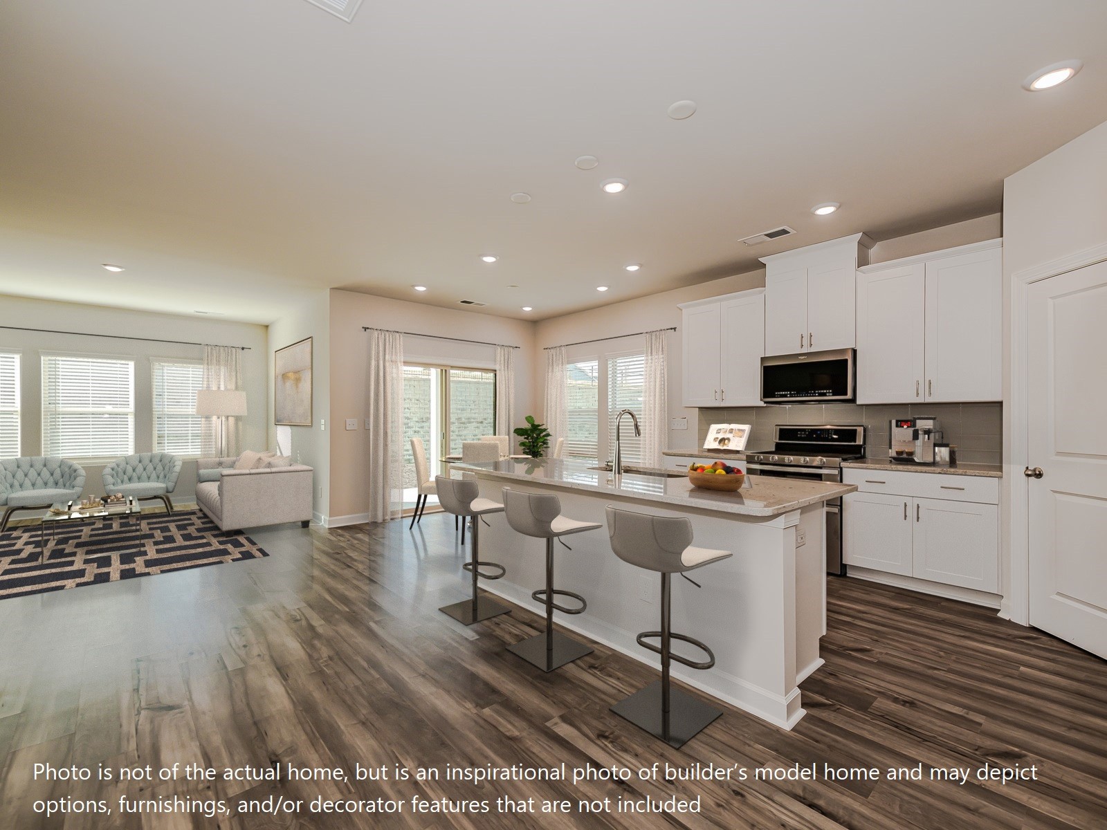 1097 Holland Ridge Way Lebanon, TN 37090 - Photo 10 of 11 a kitchen with a sink and white cabinets with wooden floor