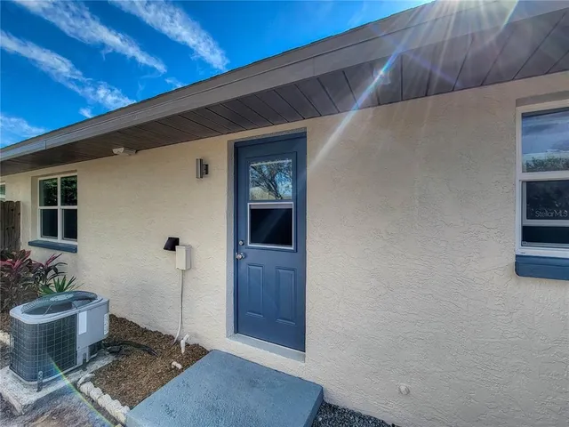 a bathroom with a toilet and shower