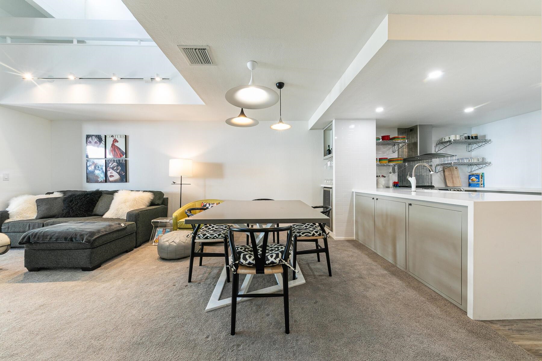 135 Alpine Meadows Road, Unit 15 Alpine Meadows, CA 96145 - Photo 14 of 28 a living room with furniture and a wooden floor