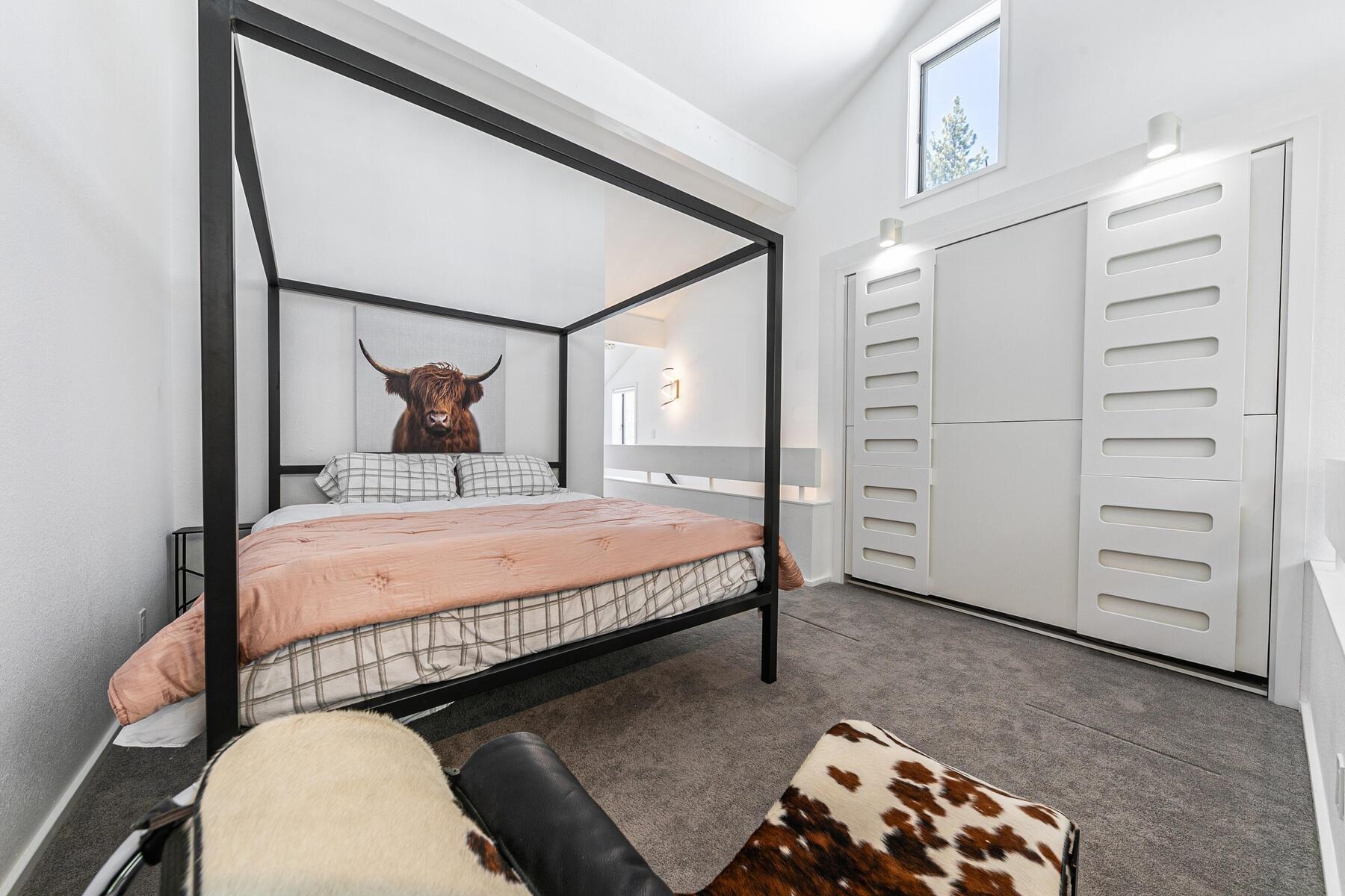 135 Alpine Meadows Road, Unit 15 Alpine Meadows, CA 96145 - Photo 21 of 28 a bed room with a bed and a closet