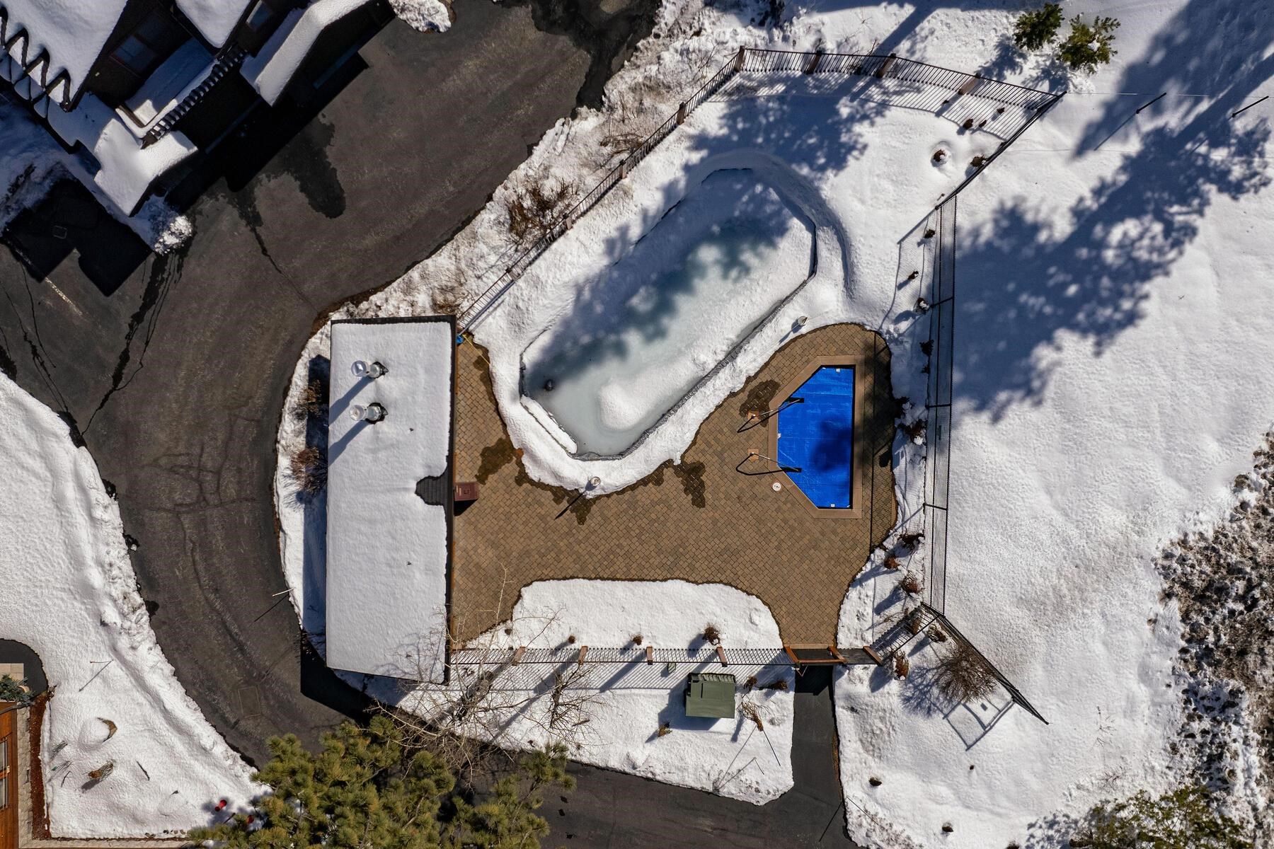 135 Alpine Meadows Road, Unit 15 Alpine Meadows, CA 96145 - Photo 25 of 28 an aerial view of a highlighted house