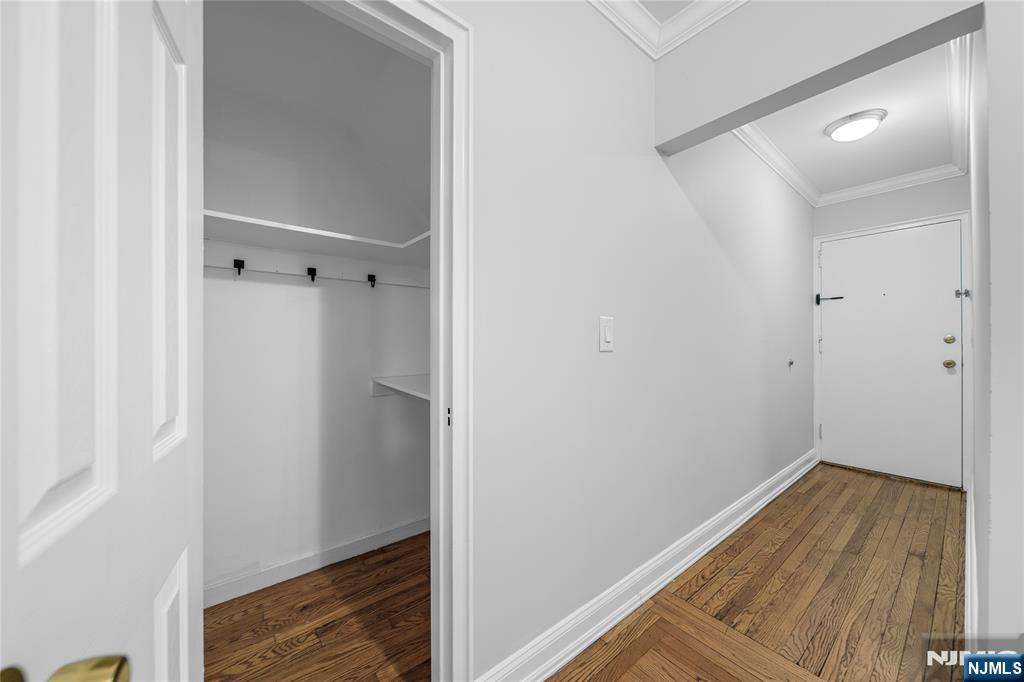 90 Tracey Place, Unit I1 Englewood, NJ 07631 - Photo 15 of 21 a view of small space with wooden floor