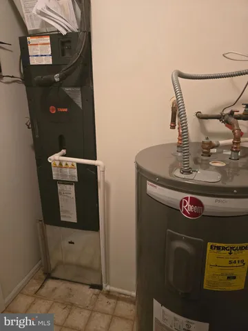 a utility room with washer and dryer