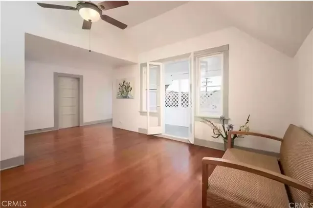 a view of a livingroom with furniture and wooden floor