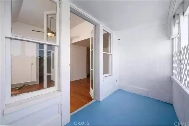 an empty room with windows